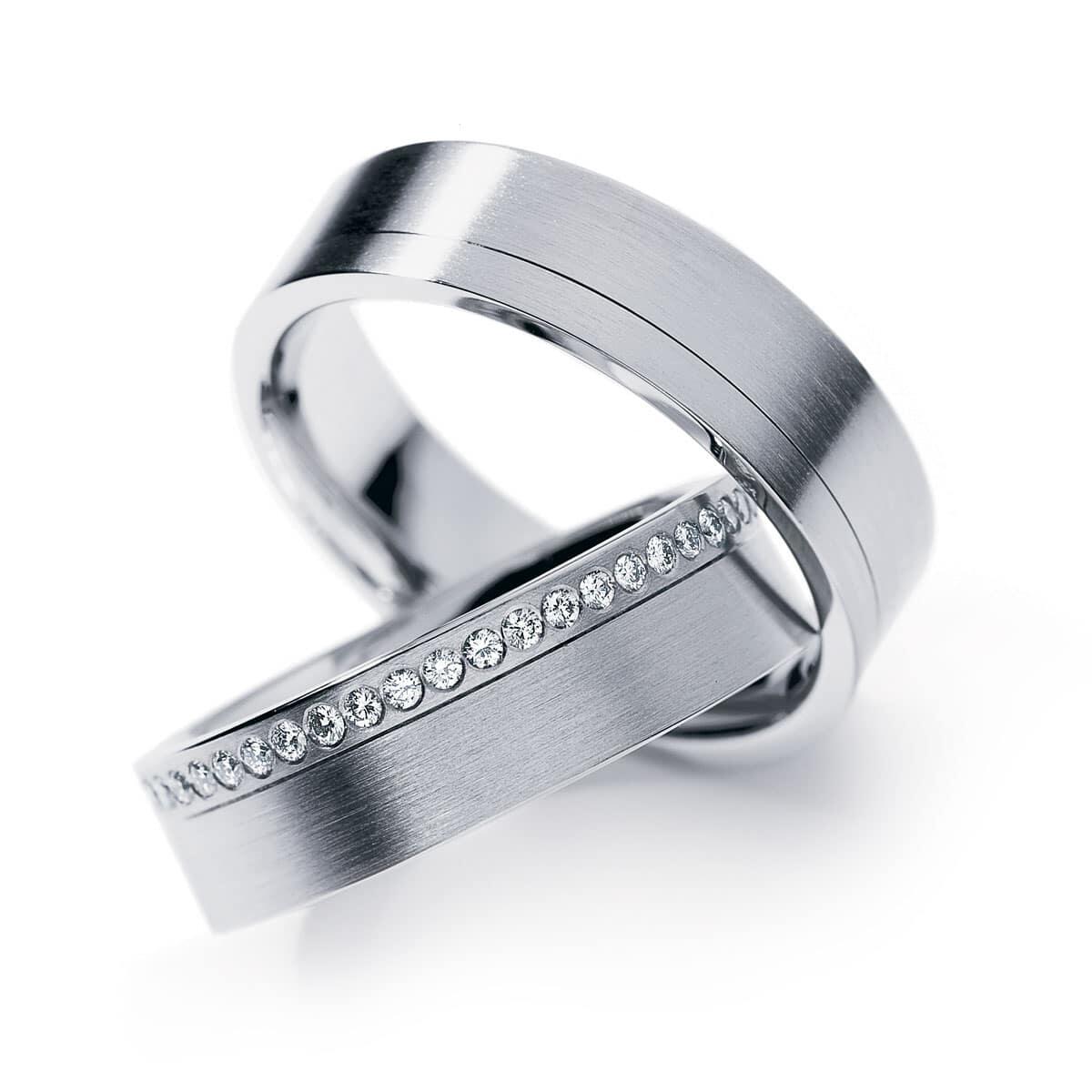 Thick White Gold Wedding Band With Tiny White Diamonds Around Band