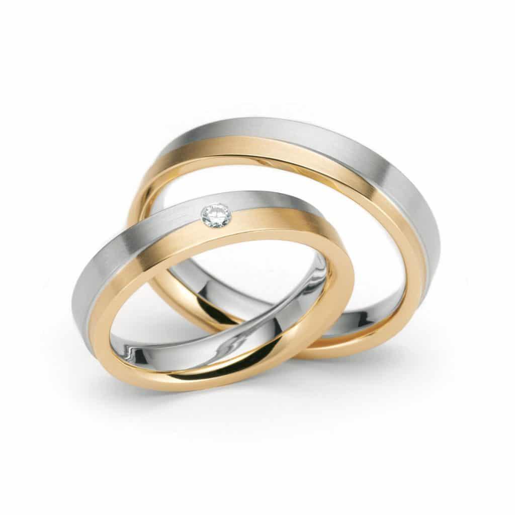Half Yellow Gold Half White Gold Wedding Ring with One Diamond In The Middle